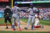 New York Mets' Starling Marte, center left, celebrates after his home run with Francisco Lindor, center right, during a baseball game against the Philadelphia Phillies, Saturday, June 24, 2023, in Philadelphia. (AP Photo/Chris Szagola)