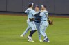 Toronto Blue Jays' George Springer, left, Daulton Varsho, center, and Kevin Kiermaier (39) celebrate after a baseball game against the Miami Marlins, in Miami, Fla., Wednesday, June 21, 2023. All it takes is 30 seconds in Toronto's clubhouse to see that Daulton Varsho has fit right in with the Blue Jays. THE CANADIAN PRESS/AP-Lynne Sladky