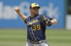 Milwaukee Brewers starting pitcher Corbin Burnes delivers against the Cleveland Guardians during the first inning of a baseball game, Sunday, June 25, 2023, in Cleveland. (AP Photo/Ron Schwane)