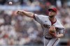 Arizona Diamondbacks' Merrill Kelly throws during the first inning of a baseball game against the San Francisco Giants in San Francisco, Saturday, June 24, 2023. (AP Photo/Jed Jacobsohn)