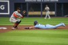 Toronto Blue Jays' Whit Merrifield (15) is caught stealing second base as San Francisco Giants second baseman Thairo Estrada (39) prepares to make the tag during second inning MLB Interleague baseball action in Toronto on Tuesday, June 27, 2023. THE CANADIAN PRESS/Andrew Lahodynskyj