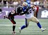 JUSTIN TANG/ CANADIAN PRESS FILES
                                Bombers RB Brady Oliveira tries to break away from Redblacks DB Douglas Coleman III Saturday in Ottawa.
