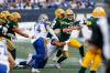 Ricky Walker of the Bombers hauls down Edmonton Elks quarterback Taylor Cornelius Thursday night at IG Field in Winnipeg.  (John Woods / The Canadian Press)