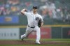 Detroit Tigers pitcher Matt Manning throws in the rain against the Toronto Blue Jays in the first inning of a baseball game, Saturday, July 8, 2023, in Detroit. (AP Photo/Paul Sancya)