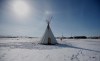 A teepee is shown as Christopher Traverse, Chief of Lake St. Martin First Nation speaks to the media at Winnipeg's Brady Landfill just outside the city, Thursday, April 6, 2023. The City of Winnipeg has ordered protesters who have been blocking access to a landfill in support of a search for the remains of two Indigenous women to leave. THE CANADIAN PRESS/John Woods