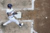 Milwaukee Brewers' Blake Perkins breaks his bat as he grounds into a double play during the eighth inning of a baseball game against the Cincinnati Reds Sunday, July 9, 2023, in Milwaukee. (AP Photo/Morry Gash)