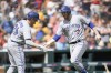 Toronto Blue Jays' Danny Jansen, right, celebrates his two-run home run with Matt Chapman against the Detroit Tigers in the ninth inning of a baseball game, Sunday, July 9, 2023, in Detroit. (AP Photo/Paul Sancya)