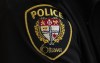 A close-up of an Ottawa Police officer’s badge is seen, in Ottawa, Thursday, April 28, 2022. Ottawa Police Service (OPS) says more than 20 people overdosed over the weekend. THE CANADIAN PRESS/Adrian Wyld