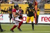 Ottawa Redblacks quarterback Dustin Crum (18) runs into the end zone for a touchdown during first half CFL football game action against the Hamilton Tiger-Cats in Hamilton, Ont. on Saturday, July 8, 2023.&nbsp;The rookie quarterback will make his first CFL start Saturday when the Ottawa Redblacks (1-3) host Winnipeg (4-1). THE CANADIAN PRESS/Peter Power