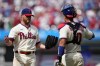 Philadelphia Phillies' Craig Kimbrel, left, and J.T. Realmuto celebrate after the Phillies won the first baseball game in a doubleheader against the San Diego Padres, Saturday, July 15, 2023, in Philadelphia. (AP Photo/Matt Slocum)