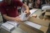 FILE - An election worker shows ballots to the media before being distributed at polling stations, at a warehouse in Barcelona, Spain, July 18, 2023. Claims of vote rigging and election fraud are spreading in Spain ahead of that nation's pivotal election on Sunday. The allegations are strikingly similar to claims spread by ex-President Donald Trump and others in the United States ahead of the 2020 election. (AP Photo/Emilio Morenatti, File)