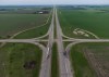 A scorched patch of ground where a bus carrying seniors ended up after colliding with a transport truck is seen on the edge of the Trans-Canada Highway where it intersects with Highway 5, near Carberry, Man., on Friday, June 16, 2023. THE CANADIAN PRESS/Darryl Dyck