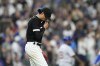 Chicago White Sox relief pitcher Joe Kelly reacts after walking Chicago Cubs' Mike Tauchman with the bases loaded during the fifth inning of a baseball game, Wednesday, July 26, 2023, in Chicago. (AP Photo/Charles Rex Arbogast)