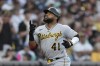 FILE - Pittsburgh Pirates' Carlos Santana celebrates after hitting a two-run home run during the third inning of a baseball game against the San Diego Padres, Monday, July 24, 2023, in San Diego. Carlos Santana is heading to Milwaukee. The Brewers are acquiring the veteran first baseman/designated hitter from the Pittsburgh Pirates in exchange for minor leaguer Jhonny Severino, a source tells The Associated Press. (AP Photo/Gregory Bull, File)