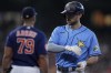 Tampa Bay Rays' Brandon Lowe stands at first after hitting an RBI single during the fourth inning of a baseball game against the Houston Astros, Sunday, July 30, 2023, in Houston. (AP Photo/Kevin M. Cox)