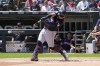 Cleveland Guardians' Josh Naylor hits a single during the first inning of a baseball game against the Chicago White Sox in Chicago, Sunday, July 30, 2023. (AP Photo/Nam Y. Huh)