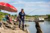 MIKAELA MACKENZIE / WINNIPEG FREE PRESS
                                Tara Singleton competes the shore-angling event Wednesday at the World Police and Fire Games along the Red River in Lockport.