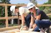 Supplied
                                Martha Hinton (left) and Trisha Veness put their construction skills to work on a Pandora Avenue home project Thursday.