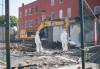 Mike Thiessen / Winnipeg Free Press
                                The rubble from buildings in the 800 block of Main Street that burned down in February are finally being cleaned up, following battles between the city, the province, and the building owners over asbestos testing.