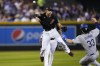 Arizona Diamondbacks' Nick Ahmed forces out Los Angeles Dodgers' James Outman (33) on a force out hit by Amed Rosario during the third inning of a baseball game, Tuesday, Aug. 8, 2023, in Phoenix. (AP Photo/Matt York)