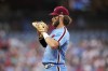 Philadelphia Phillies' Bryce Harper covers first base during the third inning of a baseball game against the Washington Nationals, Thursday, Aug. 10, 2023, in Philadelphia. (AP Photo/Matt Slocum)