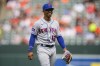 New York Mets shortstop Francisco Lindor reacts after a play during the third inning of a baseball game against the Baltimore Orioles, Sunday, Aug. 6, 2023, in Baltimore. (AP Photo/Julio Cortez)