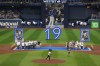 Former Toronto Blue Jays player Jose Bautista throws the ceremonial first pitch after his name was unveiled on the Jays' Level of Excellence, ahead of their MLB interleague baseball game against the Chicago Cubs, in Toronto, Saturday, Aug. 12, 2023. THE CANADIAN PRESS/Chris Young
