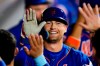 New York Mets' Brandon Nimmo celebrates with teammates after hitting a home run during the sixth inning of a baseball game against the Pittsburgh Pirates, Monday, Aug. 14, 2023, in New York. (AP Photo/Frank Franklin II)