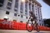 A person rides a bicycle near the Fulton County Courthouse, Monday, Aug. 14, 2023, in Atlanta. A grand jury in Georgia heard from witnesses into the evening Monday in the election subversion investigation into Donald Trump, a long day of testimony punctuated by the mysterious and brief appearance on a county website of a list of criminal charges against the former president that prosecutors later disavowed. (AP Photo/Alex Slitz)