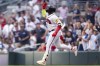 Atlanta Braves' Marcell Ozuna celebrates his two-run home run against the New York Yankees during the first inning of a baseball game Tuesday, Aug. 15, 2023, in Atlanta. (AP Photo/Hakim Wright Sr.)