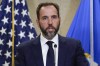 FILE - Special counsel Jack Smith speaks to the media about an indictment of former President Donald Trump, Aug. 1, 2023, at an office of the Department of Justice in Washington. A slim majority of Americans approve of the U.S. Justice Department indicting Donald Trump over his efforts to remain in office after losing the 2020 election, according to a new poll from The Associated Press-NORC Center for Public Affairs Research. (AP Photo/J. Scott Applewhite, File)