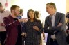Chicago Cubs left fielder Ian Happ, left, his wife Julie, talk to Cubs Chairman Tom Rickets about the work of British artist Pat Vale titled 