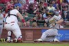 Oakland Athletics' Nick Allen, right, prepares to be tagged out at home by St. Louis Cardinals catcher Andrew Knizner during the fourth inning of a baseball game Wednesday, Aug. 16, 2023, in St. Louis. (AP Photo/Jeff Roberson)
