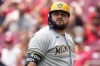 FILE - Milwaukee Brewers' Rowdy Tellez (11) looks on during a baseball game against the Cincinnati Reds in Cincinnati, Sunday, June 4, 2023. Brewers first baseman Rowdy Tellez has rejoined the team after spending six weeks on the injured list. The Brewers announced before their Saturday, Aug. 19, 2023, game with the Texas Rangers that they have reinstated Tellez and optioned infielder Abraham Toro to Triple-A Nashville. (AP Photo/Jeff Dean, File)