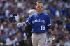 Kansas City Royals' Michael Massey tosses his helmet after striking out during the seventh inning of a baseball game against the Chicago Cubs, Saturday, Aug. 19, 2023, in Chicago. (AP Photo/Erin Hooley)