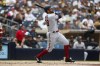 Arizona Diamondbacks' Tommy Pham hits a triple during the third inning in the first baseball game of a doubleheader against the San Diego Padres, Saturday, Aug 19, 2023, in San Diego. (AP Photo/Brandon Sloter)