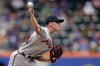 Atlanta Braves pitcher Allan Winans throws to the New York Mets during the first inning in the first baseball game of a doubleheader on Saturday, Aug. 12, 2023, in New York. (AP Photo/Adam Hunger)