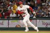 Los Angeles Angels' Shohei Ohtani runs toward second but is forced out during the sixth inning of the second baseball game of the team's doubleheader against the Tampa Bay Rays in Anaheim, Calif., Saturday, Aug. 19, 2023. (AP Photo/Michael Owen Baker)