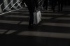 Hudson’s Bay has revamped its loyalty program with a new app and personalized offers. A shopper make his way through a walkway connecting Eaton Centre Mall and The Hudson Bay store in Toronto on Monday, May 1, 2023. THE CANADIAN PRESS/Chris Young