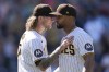 San Diego Padres relief pitcher Josh Hader, left, celebrates with shortstop Xander Bogaerts after the Padres defeated the Miami Marlins 4-0 in a baseball game Wednesday, Aug. 23, 2023, in San Diego. (AP Photo/Gregory Bull)