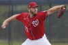 FILE - Washington Nationals pitcher Stephen Strasburg throws live batting practice in a drizzle during the team's spring training baseball workout March 15, 2022, in West Palm Beach, Fla. Nationals pitcher Stephen Strasburg has decided to announce his retirement, ending a career that began as a No. 1 draft pick, included 2019 World Series MVP honors and was derailed by injuries, according to a person with knowledge of the situation. The person spoke to The Associated Press on condition of anonymity Thursday because Strasburg has not spoken publicly about his plans. (AP Photo/Sue Ogrocki, File)