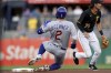 Chicago Cubs' Nico Hoerner (2) gets to second base with a double against the Pittsburgh Pirates in the first inning of a baseball game in Pittsburgh, Thursday, Aug. 24, 2023. (AP Photo/Matt Freed)