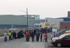 People without vehicles lineup to register for a flight to Calgary, Alberta, in Yellowknife on Thursday, August 17, 2023. The premiers of Alberta and the Northwest Territories are scheduled to tour a Calgary reception centre for wildfire evacuees from the territory this afternoon. THE CANADIAN PRESS/Bill Braden