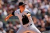New York Yankees' Clarke Schmidt pitches during the first inning of a baseball game against the Boston Red Sox, Sunday, Aug. 20, 2023, in New York. (AP Photo/Frank Franklin II)