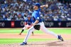 The Toronto Blue Jays placed right-hander Erik Swanson on the 15-day injured list on Sunday.&nbsp;Swanson (50) throws to a Chicago Cubs batter in eighth inning MLB interleague baseball action in Toronto, Sunday, Aug. 13, 2023. THE CANADIAN PRESS/Jon Blacker