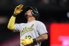 Oakland Athletics' Jordan Diaz reacts after hitting a single against the Seattle Mariners during the sixth inning of a baseball game Tuesday, Aug. 29, 2023, in Seattle. (AP Photo/Lindsey Wasson)