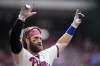 Philadelphia Phillies' Bryce Harper reacts after hitting a two-run home run during the eighth inning of a baseball game against the Los Angeles Angels, Wednesday, Aug. 30, 2023, in Philadelphia. (AP Photo/Matt Slocum)