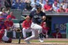 FILE - New York Yankees' Jasson Domínguez grounds out during the second inning of the team's spring training baseball game against the Philadelphia Phillies on Feb. 25, 2023, in Clearwater, Fla. Yankees owner Hal Steinbrenner said he's excited to see what an influx of young players will bring to the major league team over the final weeks of a lost season. The Yankees plan to call up top prospects Domínguez and Austin Wells on Friday, Sept. 1, when active major league rosters expand from 26 to 28. (AP Photo/David J. Phillip, File)