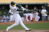 Oakland Athletics' Brent Rooker hits a two-run home run against the Los Angeles Angels during the fourth inning of a baseball game in Oakland, Calif., Saturday, Sept. 2, 2023. (AP Photo/Jeff Chiu)