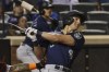 Seattle Mariners' Dominic Canzone follows through after hitting a two-run home run during the sixth inning of a baseball game against the New York Mets, Saturday, Sept. 2, 2023, in New York. (AP Photo/Jason DeCrow)